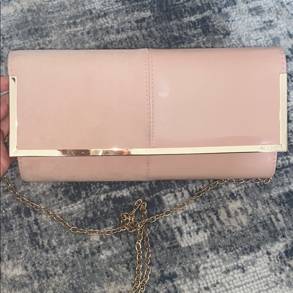 Pink clutch.